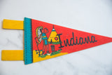 Angled view of the vintage Indiana pennant highlighting its red felt and graphic.