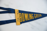 Vintage blue felt pennant detail showing yellow 'Bowling Green' text and 1956-1963 date.