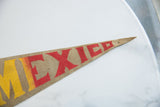 Vintage Mexico suede pennant tip, red 'ICO' lettering, and visible pin holes.