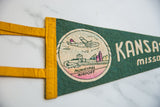 Detail of vintage Kansas City felt pennant, mid-century Municipal Airport graphic with yellow trim.