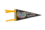 Vintage New Jersey Turnpike black felt pennant with colorful bridge and cityscape graphic, 5x12.