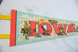 Textured felt Iowa pennant with retro red letters and state imagery.