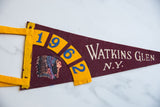 Vintage felt pennant with 1962 date, Native American chief graphic, and Watkins Glen.