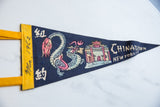 Yellow felt edge of vintage Chinatown NYC pennant, with 'Me. 1962' and Chinese script.