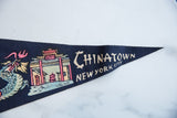 Vintage navy felt pennant with cream 'Chinatown New York City' lettering.