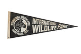 Vintage International Wildlife Park Grand Prairie Texas felt flag, black with white zebra and text, 12x30.
