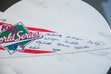 The 1987 World Series logo and blue printed player signatures on the vintage felt flag.