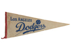 Vintage Los Angeles Dodgers felt pennant, circa 1950s, beige with blue script, baseball graphic, red binding.