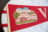 Vintage red felt pennant graphic with horse, carriage, rolling hills, and trees.