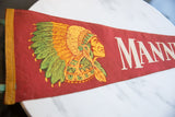 Detail of vintage Manning SC felt pennant's yellow binding and green ribbon.