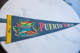 Graphic detail on vintage Puerto Rico felt pennant with 