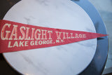 Aged red felt pennant with 