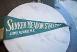 Vintage teal felt pennant displaying 'MEADOW STATE PARK LONG ISLAND, N.Y.' white text.