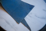 Back of the vintage felt pennant showing its deep blue texture and subtle age patina.