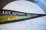 Colorful lake and forest illustration on the vintage felt banner with canoe and animals.