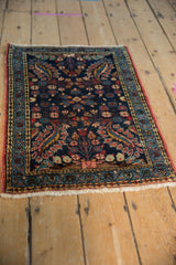 Vintage Dargezine rug mat with detailed floral bouquets, cobalt and brick colors, intact side selvages.