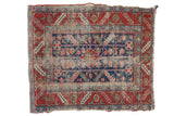 Antique Heriz square rug, bold indigo blue geometric floral field, cherry red border, circa 1910s.