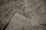 Antique Kerman rug detail: distressed pile, exposed foundation, tightly woven reverse.