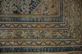 Worn indigo and antique ivory Caucasian rug borders: meandering vine Serbend boteh and pawn designs.