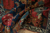Antique Bijar rug detail: cherry red Rococo cartouches and navy blue floral patterns.