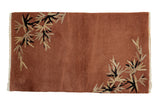 1930s Chinese Nichols Art Deco rug; rust field, ivory, navy eucalyptus sprays. 2'6