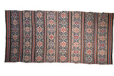 Antique Caucasian Kuba flatweave runner, geometric serpent and floral motifs in navy, terracotta, ivory.