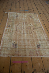 Vintage Distressed Oushak rug detail: mostly even wear to knot heads, foundation showing.