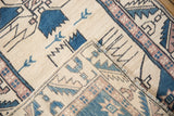 Close-up of Oushak rug pile and woven edge, showing finned geometric motifs with even wear.