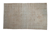 Distressed Oushak carpet, faded floral medallion in ivory and beige tones, 6'1