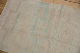 Even wear across the low-knotted pile of a distressed vintage Turkish Tulu rug.