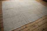 Reverse side of a vintage Oushak carpet showing its hand-woven foundation and structure.