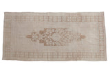 Distressed Oushak runner with lozenge medallion, ivory and coffee brown, 4'5