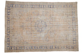 Distressed Oushak rug, faded blue floral medallion and abrashed ivory field, 7'4