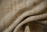 Distressed vintage Oushak rug pile texture showing knot heads, cream, coffee tones.