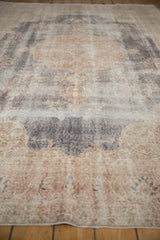 Distressed vintage Sparta carpet with mostly even wear across knot heads, foundation visible.