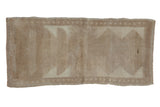 Distressed Tulu rug runner with primitive beige and ivory triangular pattern. 1'10