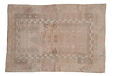 Distressed vintage Oushak rug with prayer-oriented geometric motifs in soft silver and seafoam green.