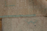 Intact side cord selvage and tightly woven reverse of the vintage Oushak rug.