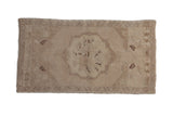 Vintage distressed Oushak rug mat with roundel medallion, faded ivory, blush, and mauve tones. 1'8