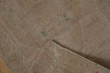 Hand-knotted reverse of vintage Oushak rug, secured side with faded teal and rose.
