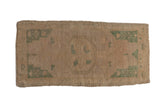 Distressed vintage Oushak runner with faded teal medallion and muted apricot beige field.