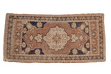 Distressed vintage Oushak runner featuring pale coffee brown, dusty navy, and oxidized silver motifs.