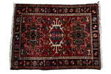 Vintage hand knotted Persian Karaja rug, brick red field, navy border, hook-latch medallion, 2x3.