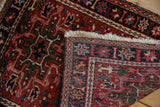 Vintage Karaja rug detail: hand-knotted foundation, plain weave end, and geometric pattern.