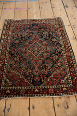 Vintage Josan Sarouk rug mat showing fine hand-knotted pile, central floral medallion, and deep navy and ruby tones.