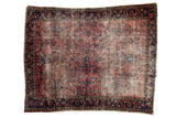 Aged Vintage Lilihan rug with cochineal red field, navy border, tree-of-life florals, 5'1