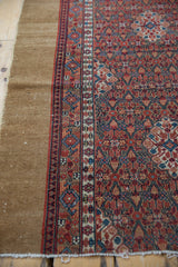 Fine vintage Serab runner side with cherry red floral pattern and camel flatweave.