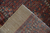 Fine vintage Serab runner corner, intricate red, blue pattern, visible foundation, subtle pile loss.