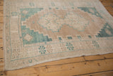 Distressed Oushak rug with camel and celadon geometric double medallion, 4'2