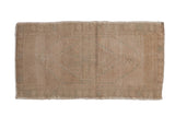 Distressed Oushak rug, muted beige abrashed field with faint green stepped medallion, 1'8